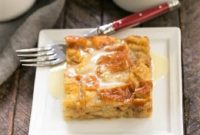 Golden Cinnamon Bread Pudding with Spirited Whiskey Sauce