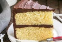 Homemade Golden Yellow Cake with Rich Chocolate Fudge Frosting