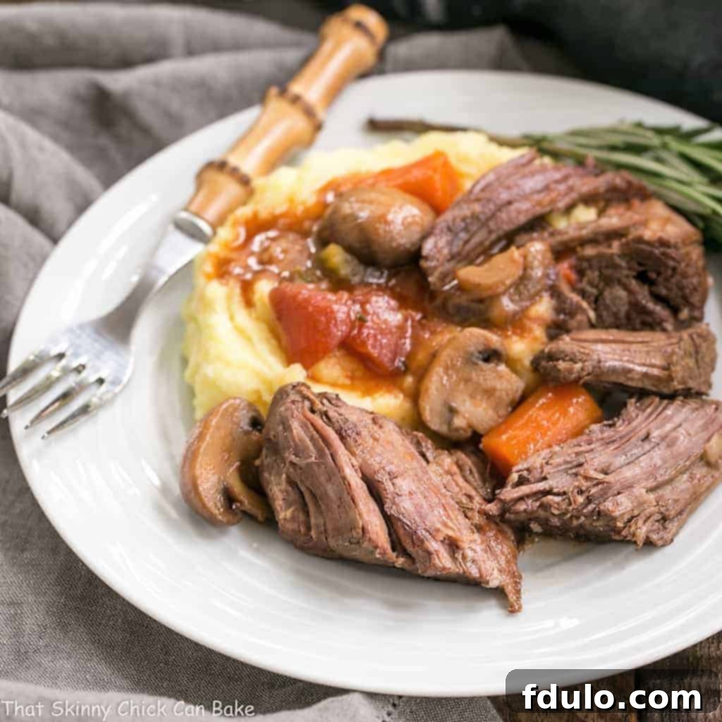 Red Wine Braised Pot Roast with Savory Mushrooms and Ripe Tomatoes 1 featured 590