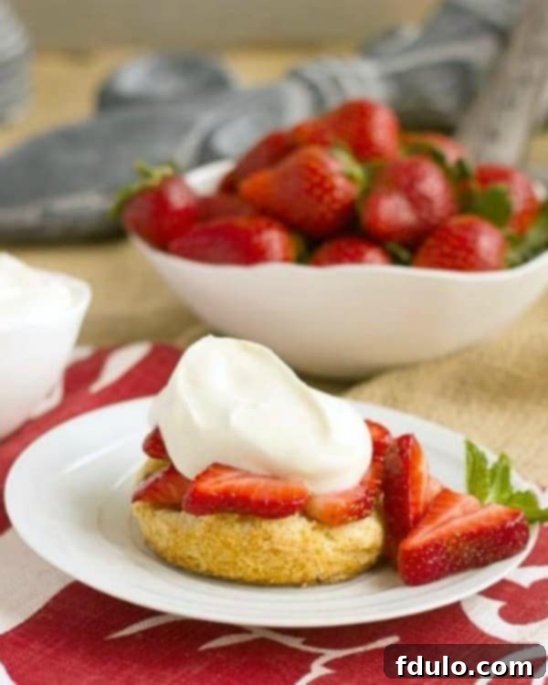 Strawberry Shortcakes with White Chocolate Whipped Cream, showcasing a decadent twist on the classic recipe.