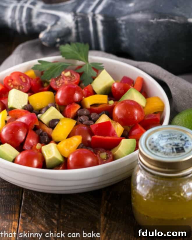 Chunky Guacamole Salad - all the fabulous flavors of guacamole in a refreshing avocado salad dressed with a lime vinaigrette.! Avocado Salad with a jar of lime vinaigrette.