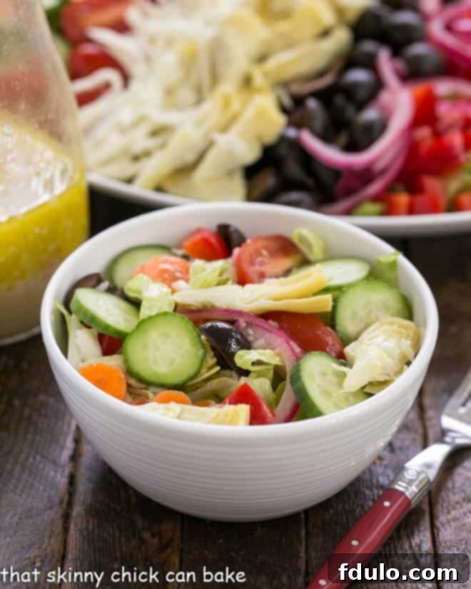 Small white bowl full of kitchen sink chopped salad