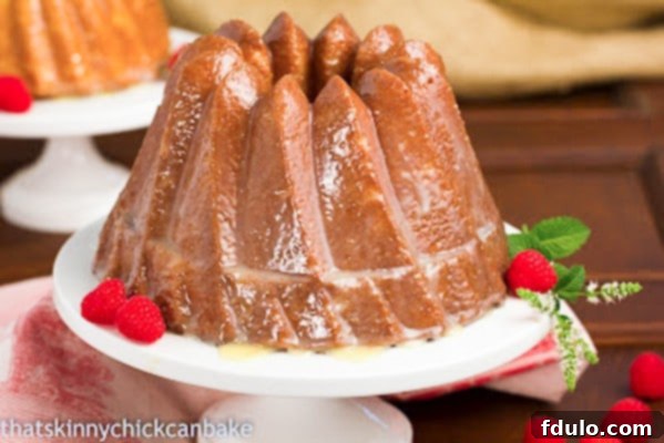 A beautifully baked White Chocolate Bundt Cake, elegantly glazed and ready to serve.