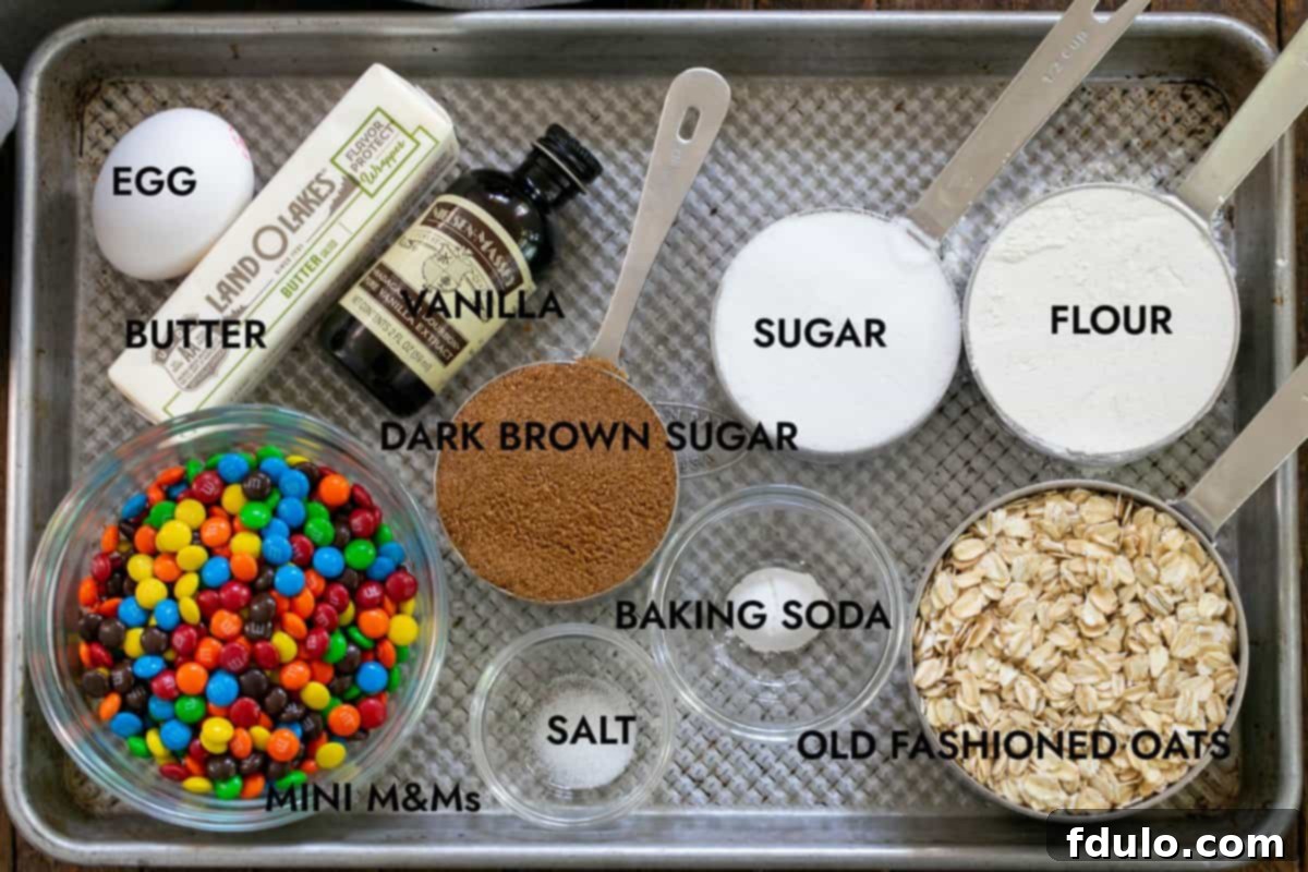 Ingredients for Oatmeal M & M Cookies  on a sheet pan.