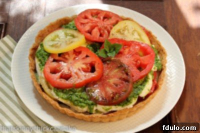 Fresh tomato tart on a white plate