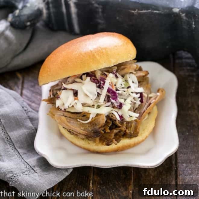 Pulled pork sandwich on a square white plate