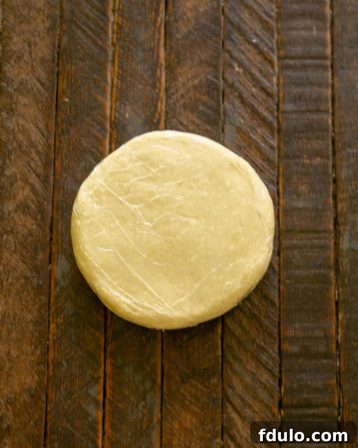 Step 2: Forming dough into a disc and chilling it.