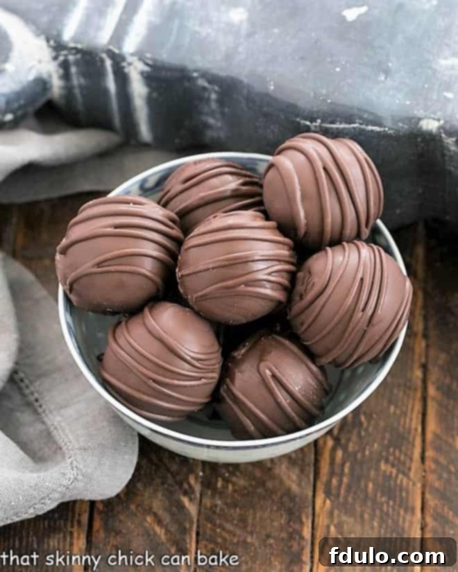 Exquisite Cookie Dough Chocolate Truffles in a charming blue and white bowl, perfect for sharing