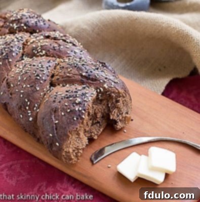Pumpernickel Loaves on a wooden cutting board