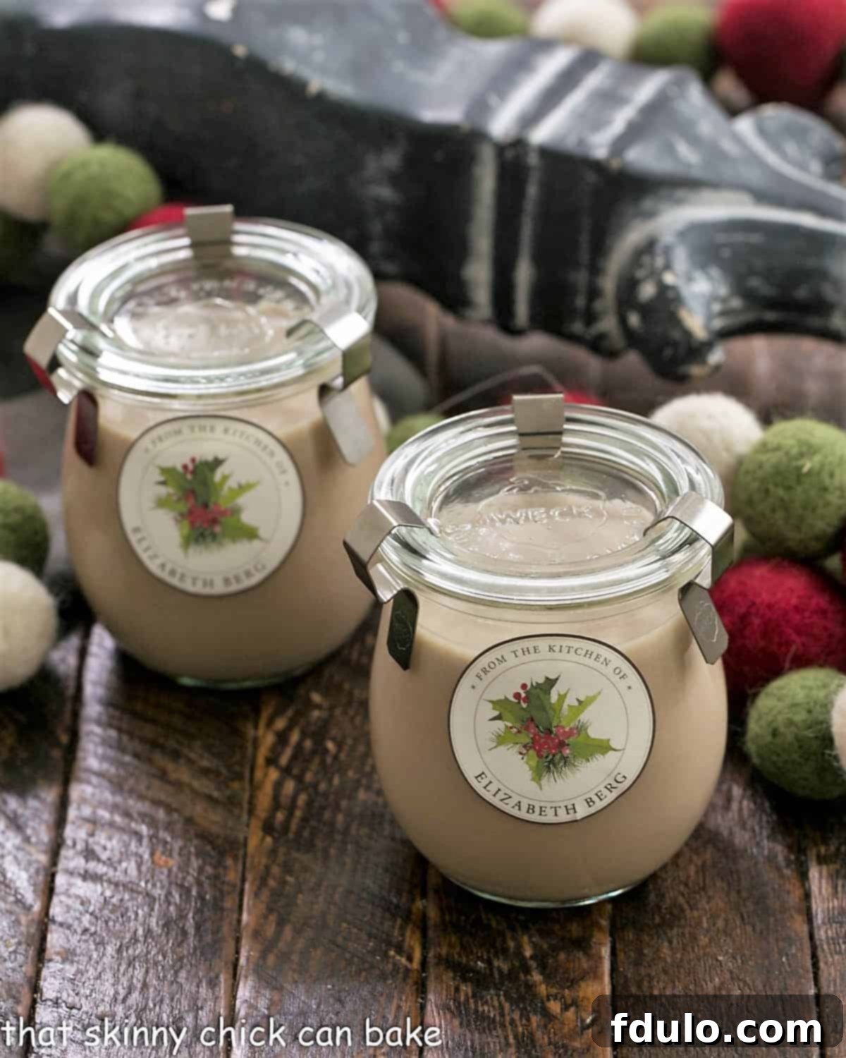 Homemade Bailey's in elegant glass jars, ready for gifting.
