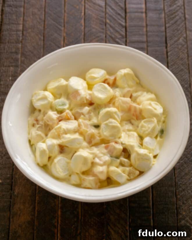 Mixed fruit with dressing.