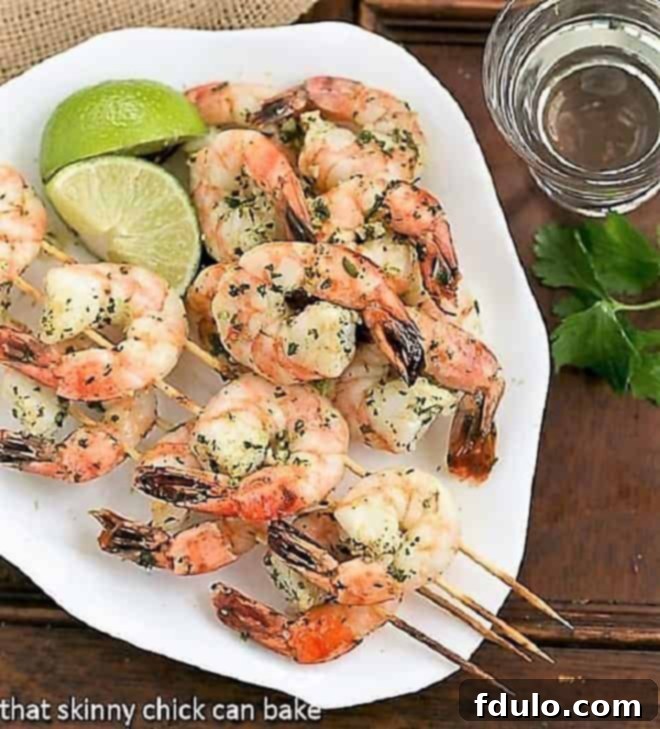 Skewered Margarita Shrimp on a white platter ready to be served