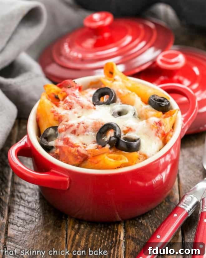 Cheesy Pasta Bake in red crocks