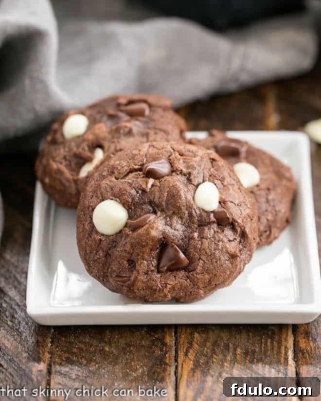 Brownie Cookies on a square white plate, showcasing their rich texture and chocolate chips.