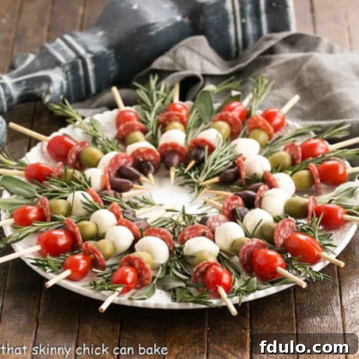 Skewered Antipasto Ingredients arranged on a platter for the holidays.
