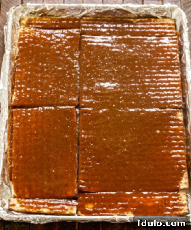 Bake the matzo with caramel for 10 minutes until bubbling and golden.