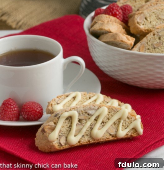 Cantuccini or Almond Biscotti perched next to a cup of hot tea
