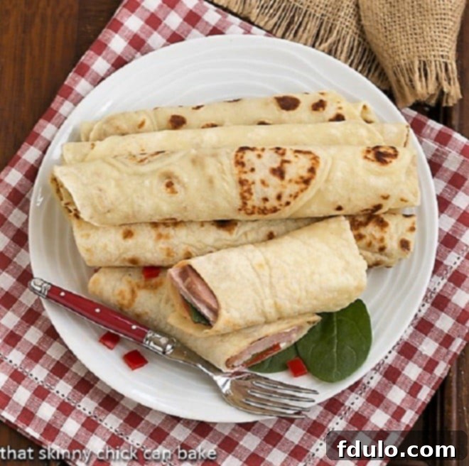 Potato Lefse - a delicious, versatile, Norwegian flatbread Potato Lefse on a white plate from above, showcasing its thin, soft texture.
