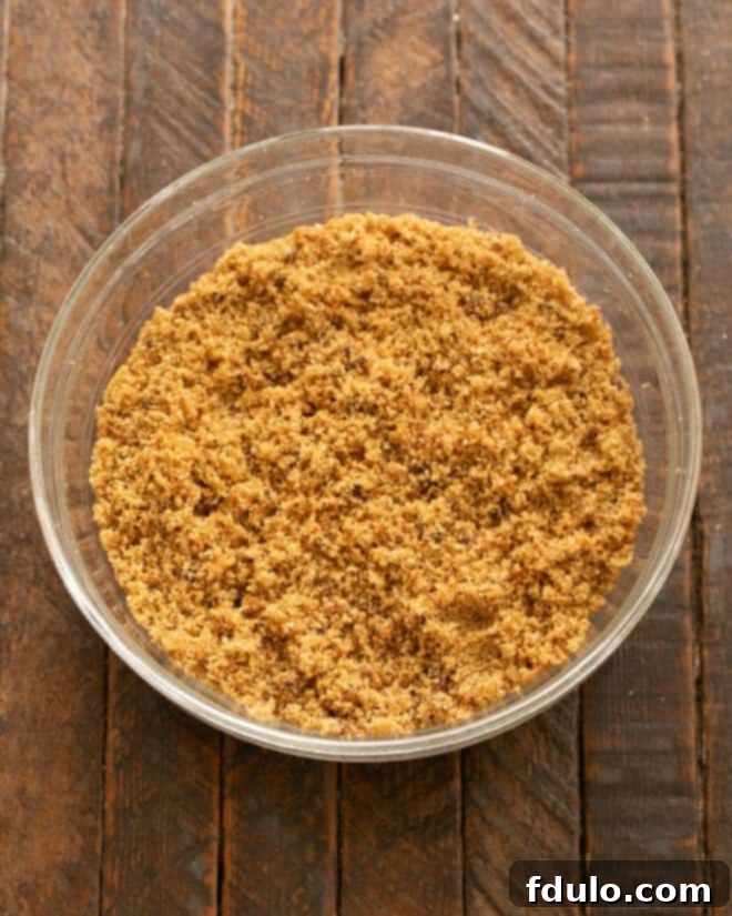 Colossal Chocolate Chip Cookies 4 Sugars and molasses mixed in a second bowl.