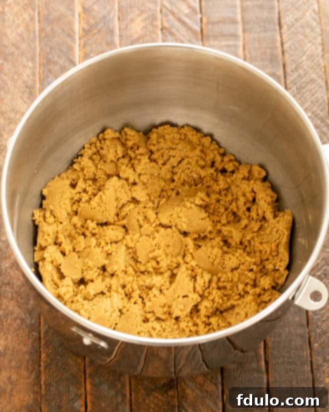 Colossal Chocolate Chip Cookies 6 Mix in dry ingredients into the wet mixture.