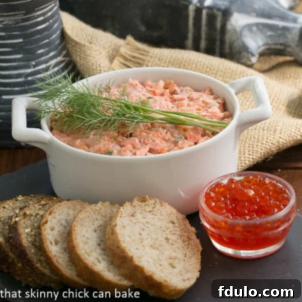 Salmon Rillettes with fresh dill and crackers, showcasing the creamy texture and inviting presentation of this French seafood spread.