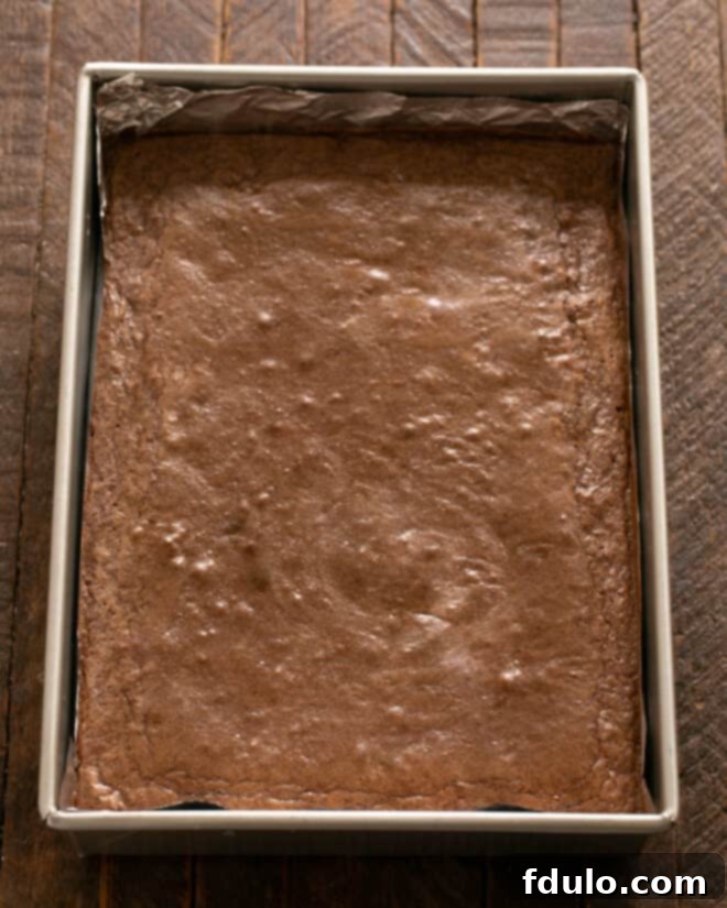 Brownies baked in the pan, cooling.