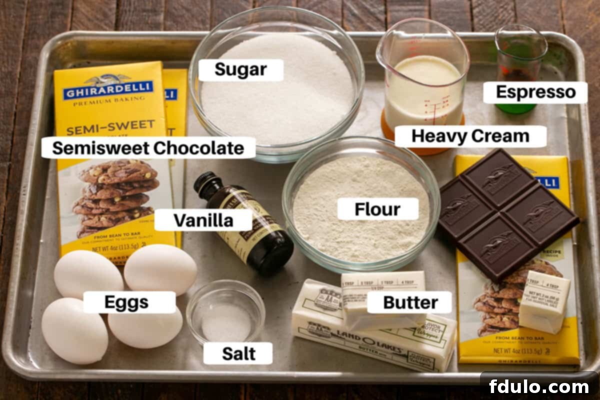 Truffle brownie ingredients with labels on a sheet pan, ready for mixing.