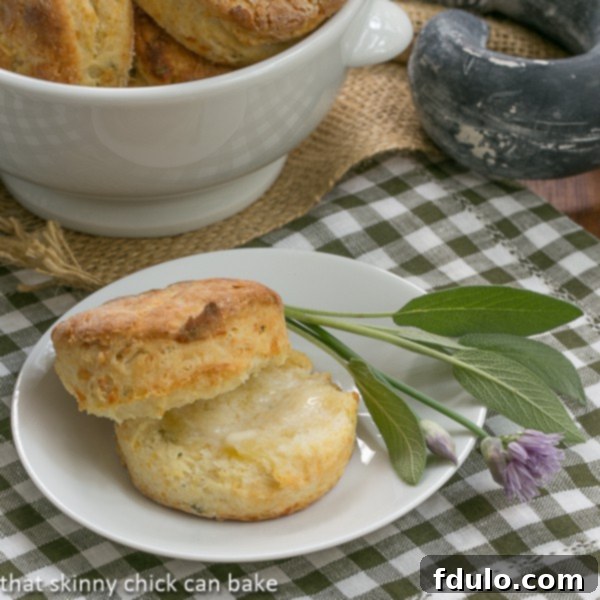 Herbed Buttermilk Biscuits, golden brown and flaky, ready to eat.