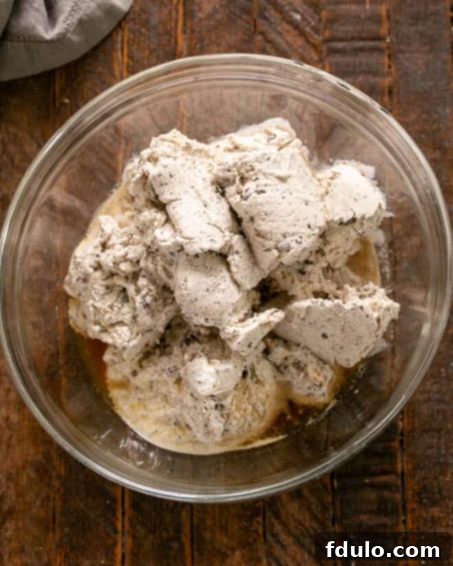 Step 2: Mix softened chocolate ice cream with Kahlua and brandy in a bowl.