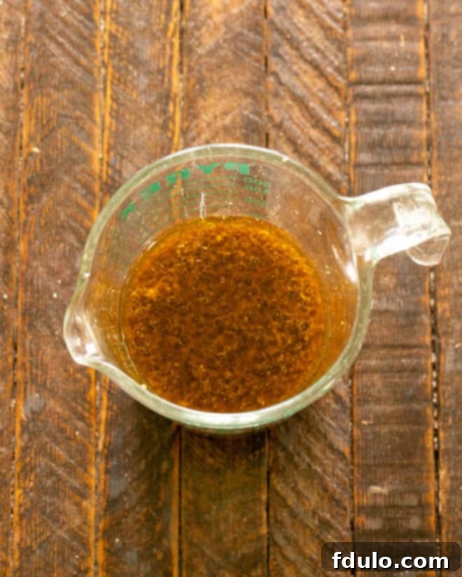 Pork Tenderloin marinade ingredients in a measuring cup.