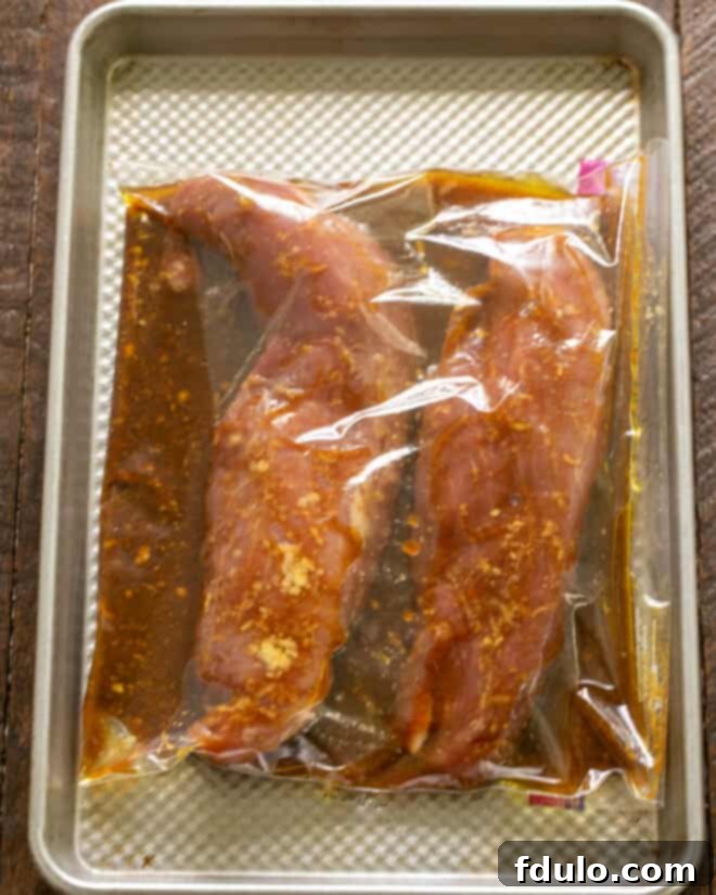 Pork and marinade in a Ziploc bag.