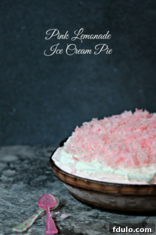 A vibrant pink lemonade ice cream pie, perfect for parties.