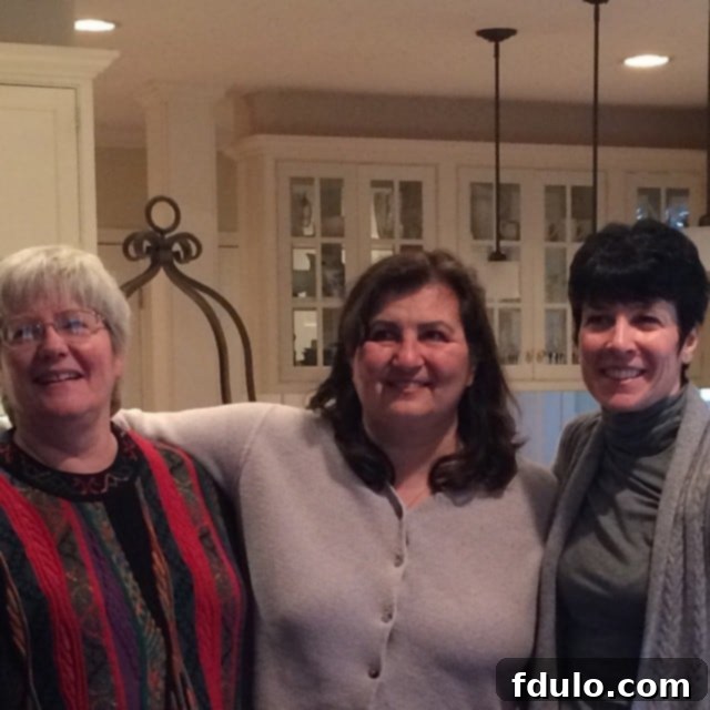 A group photo of diverse food blogger friends smiling and posing together.