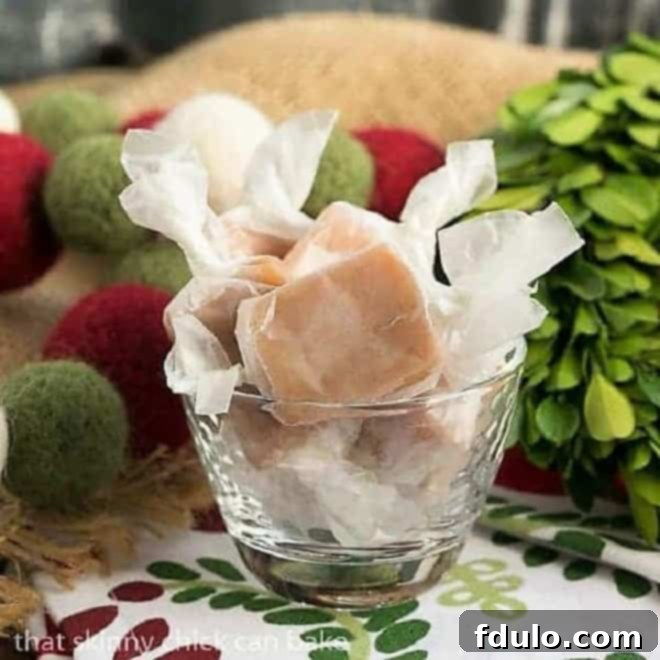 Soft Vanilla Caramels in a small glass dish, glistening with a rich golden hue, ready to be enjoyed.