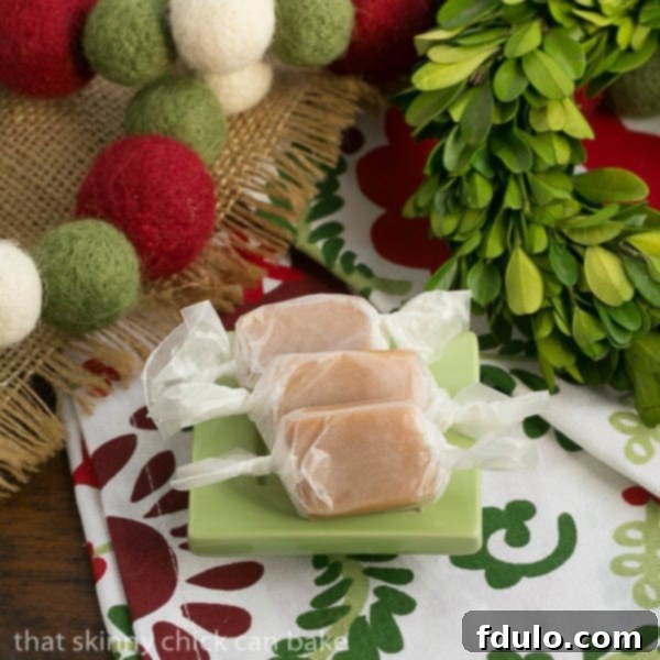 Soft Vanilla Caramels neatly lined up on a small square green plate, inviting you to savor their homemade goodness.