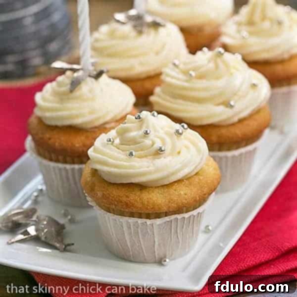 Vanilla Cupcakes with Cream Cheese Frosting | Fluffy and tender, a classic dessert favorite.