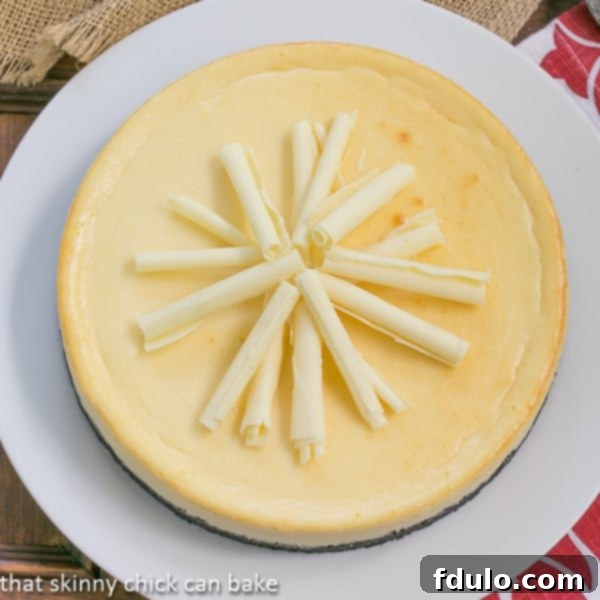 White Chocolate Frangelico Cheesecake | A luxurious and creamy cheesecake dessert.