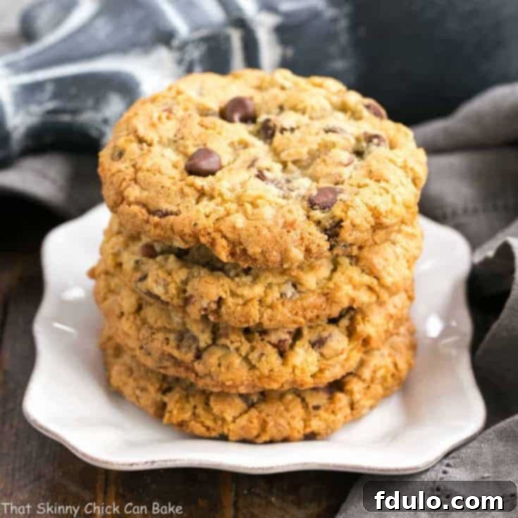 The Ultimate Cookie Recipe Collection 7 Loaded Cowboy Cookies with oats, coconut, pecans, and chocolate chips.