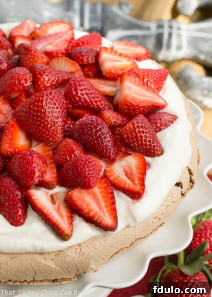 Strawberry Topped Chocolate Pavlova - A chocolate meringue topped with mascarpone cream and luscious strawberries Chocolate Pavlova - A chocolate meringue topped with mascarpone cream and luscious strawberries