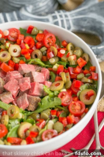 Next Day Beef Salad - Yesterday's roast beef plus whatever's in your fridge makes for a fabulous meal! Close up of Next Day Beef Salad, showcasing textures and colors of the ingredients
