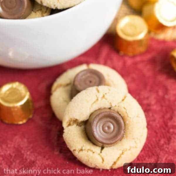 Rolo Peanut Blossoms on a red napkin, close-up view.