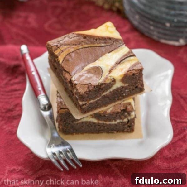 Ricotta Cheesecake Brownies | Fudgy Brownies with a delectable cheesecake swirl