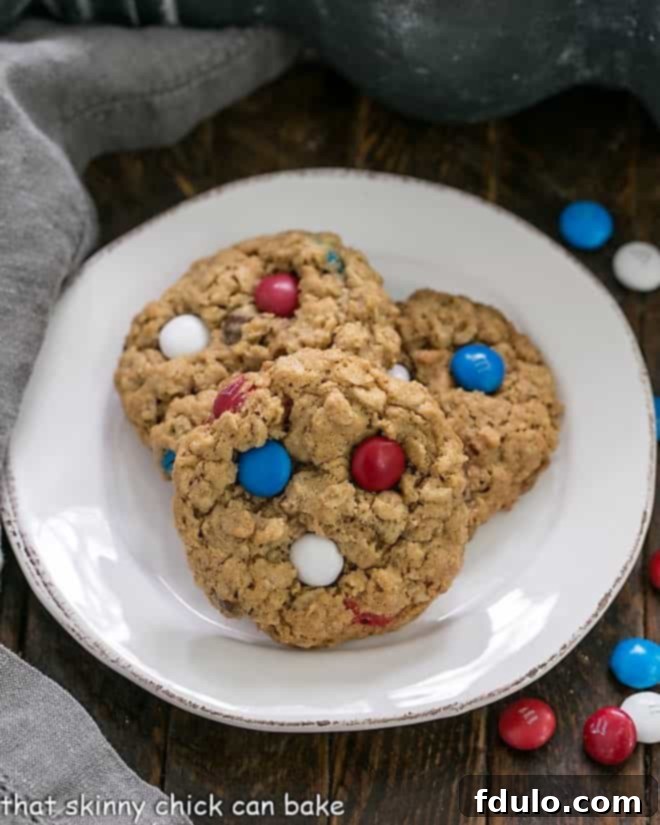 Patriotic Monster Cookies on a small round white plate, ready to be enjoyed.