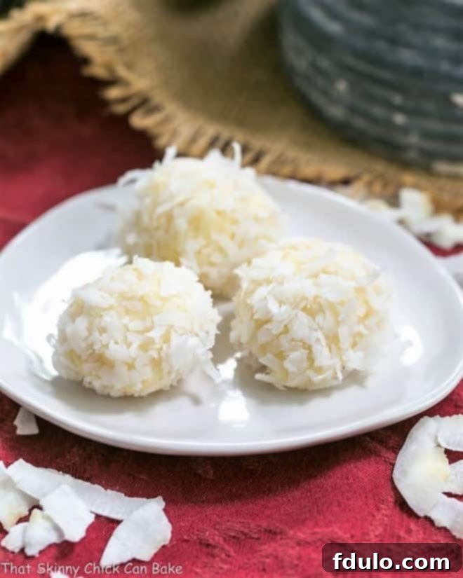 Coconut White Chocolate Truffles on an oval white plate