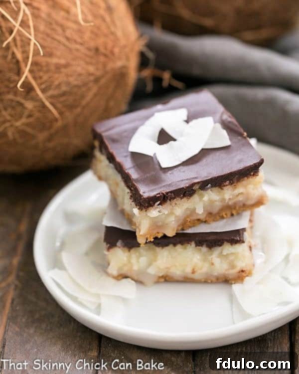 Homemade Coconut Mounds Bars with a perfect chocolate ganache, ready to be served.