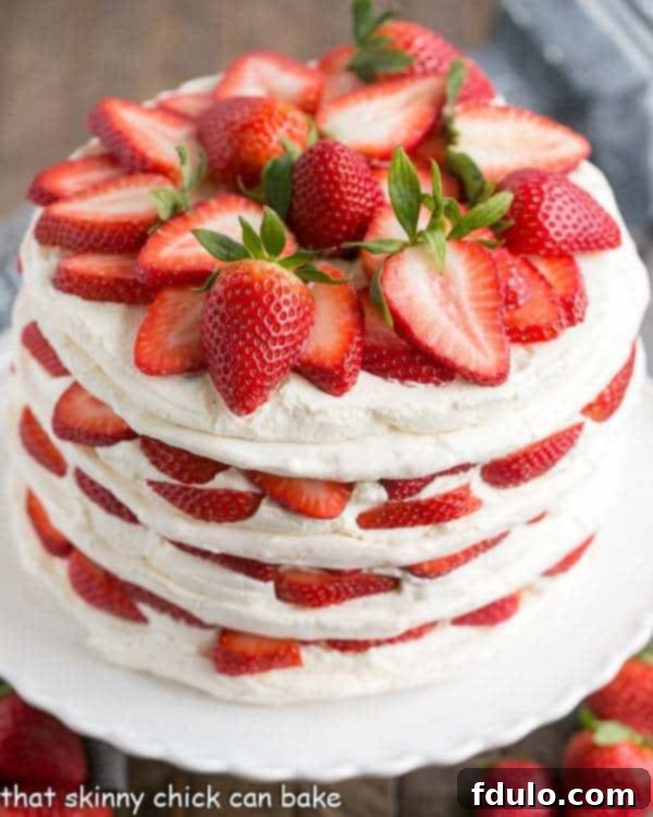 Dreamy Strawberry Meringue Cloud 2 Fresh Strawberry Meringue Cake | A luscious dessert with layers of baked meringue, fresh strawberries and mascarpone whipped cream!