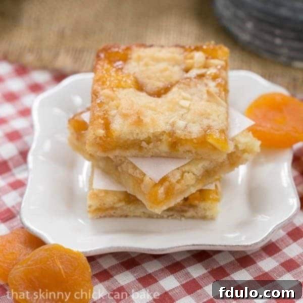 Apricot Bars | Scrumptious layered bars with coconut, almonds and apricot preserves