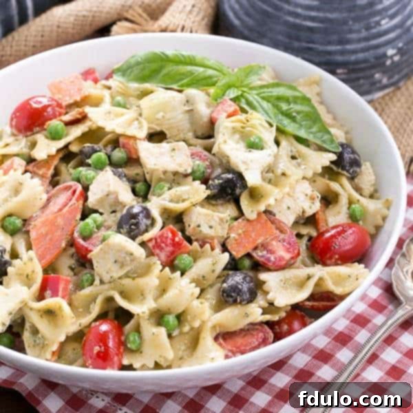 Pesto Pasta Salad Pasta with a pesto dressing and so much more!