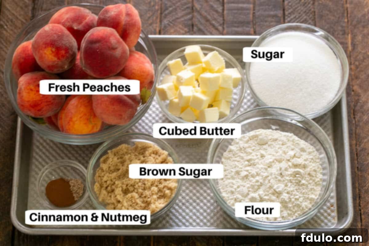 Peach Crisp Ingredients laid out on a metal sheetpan with descriptive labels.