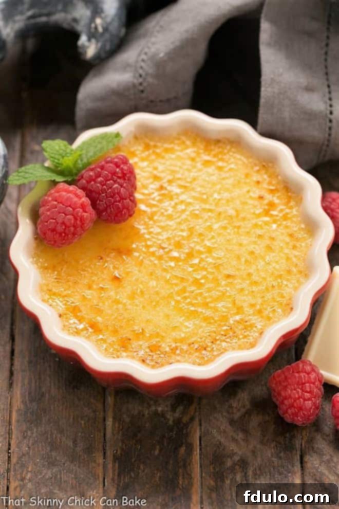 White Chocolate Crème Brûlée in a red ramekin.